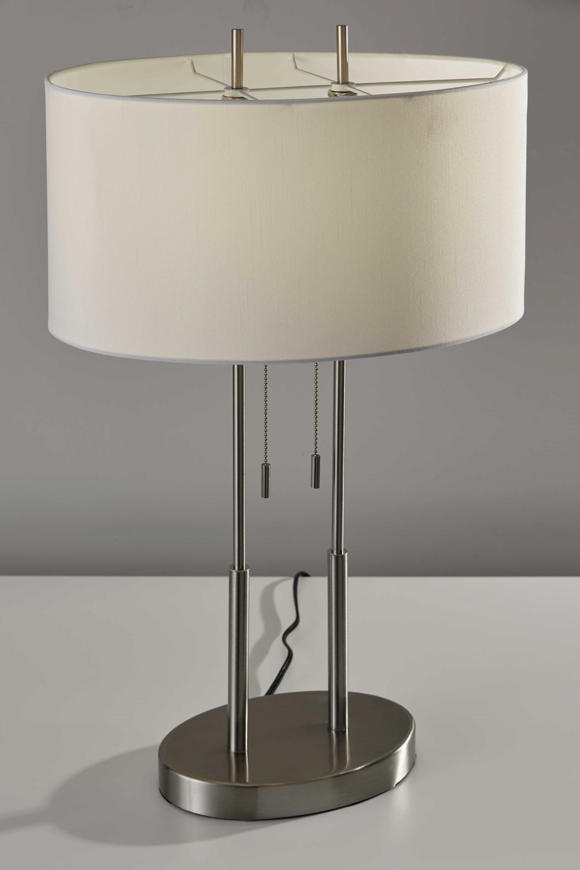 27" Silver Metal Two Light Bedside Lamp With Off White Drum Shade-Table Lamps-DECOROLALA