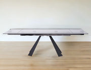 63" Clear And Black Glass And Metal Drop Leaf Pedestal Base Dining Table-Dining Tables-DECOROLALA