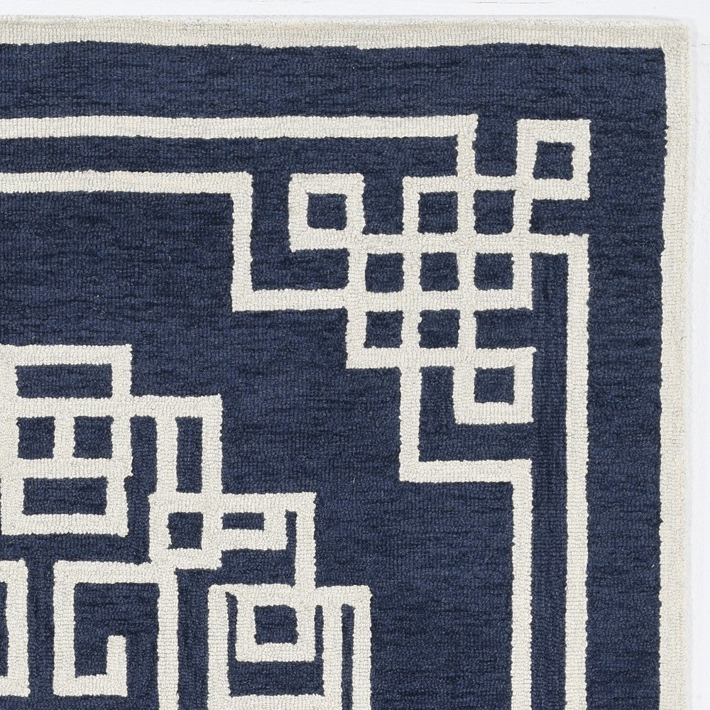 5' X 7' Navy Blue And Ivory Wool Geometric Hand Tufted Area Rug-Area Rugs-DECOROLALA