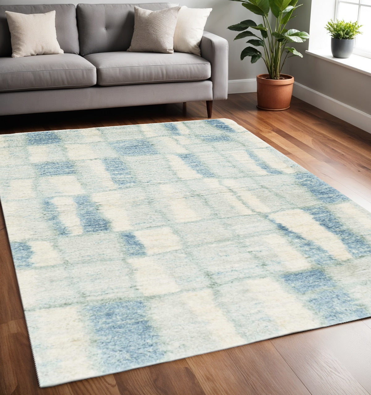 5' X 8' Ivory And Blue Abstract Area Rug-Area Rugs-DECOROLALA