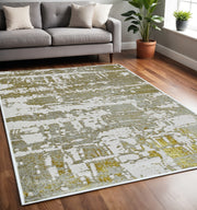 5' X 8' Ivory And Gold Abstract Area Rug-Area Rugs-DECOROLALA