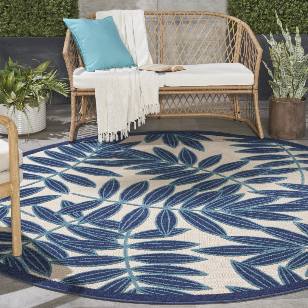 6' X 9' Blue And Ivory Floral Indoor Outdoor Area Rug-Outdoor Rugs-DECOROLALA