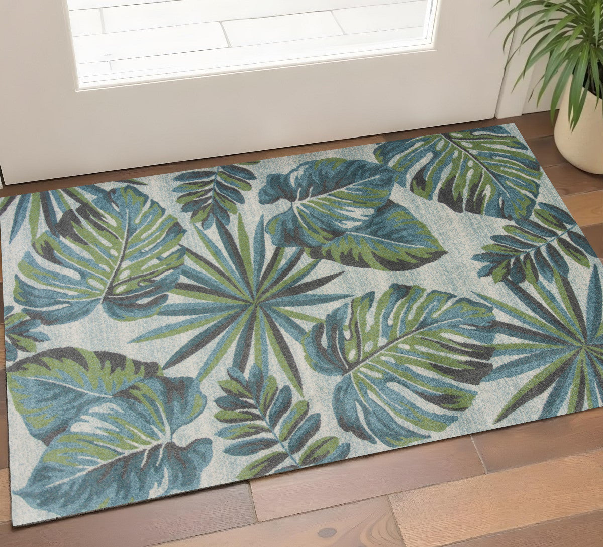 7' X 10' Beige Teal And Green Tropical Botanical Area Rug-Area Rugs-DECOROLALA