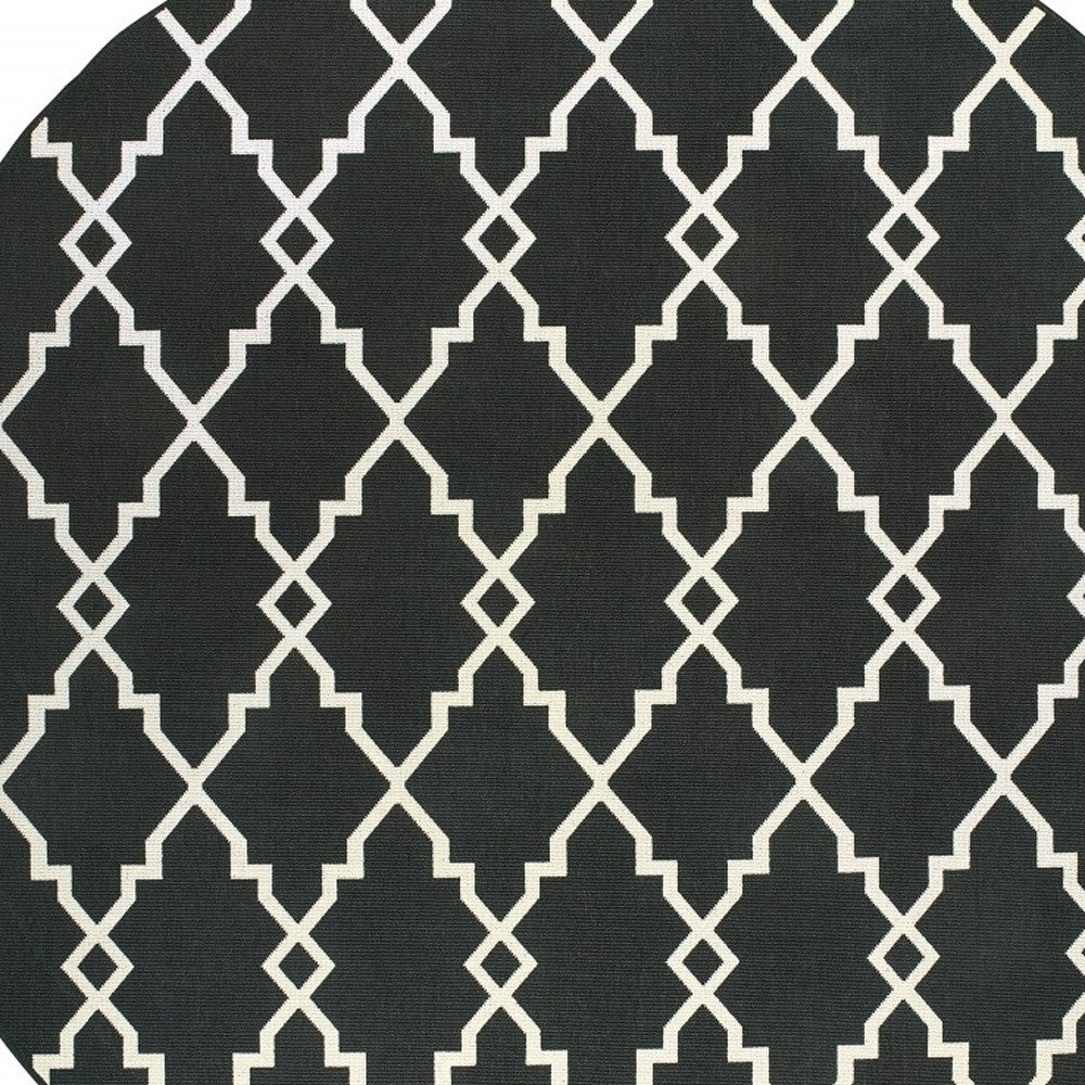 7' X 10' Black And Ivory Indoor Outdoor Area Rug-Outdoor Rugs-DECOROLALA