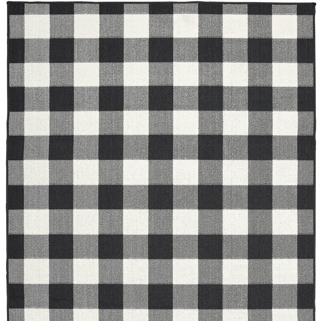 7' X 10' Black And Ivory Indoor Outdoor Area Rug-Outdoor Rugs-DECOROLALA