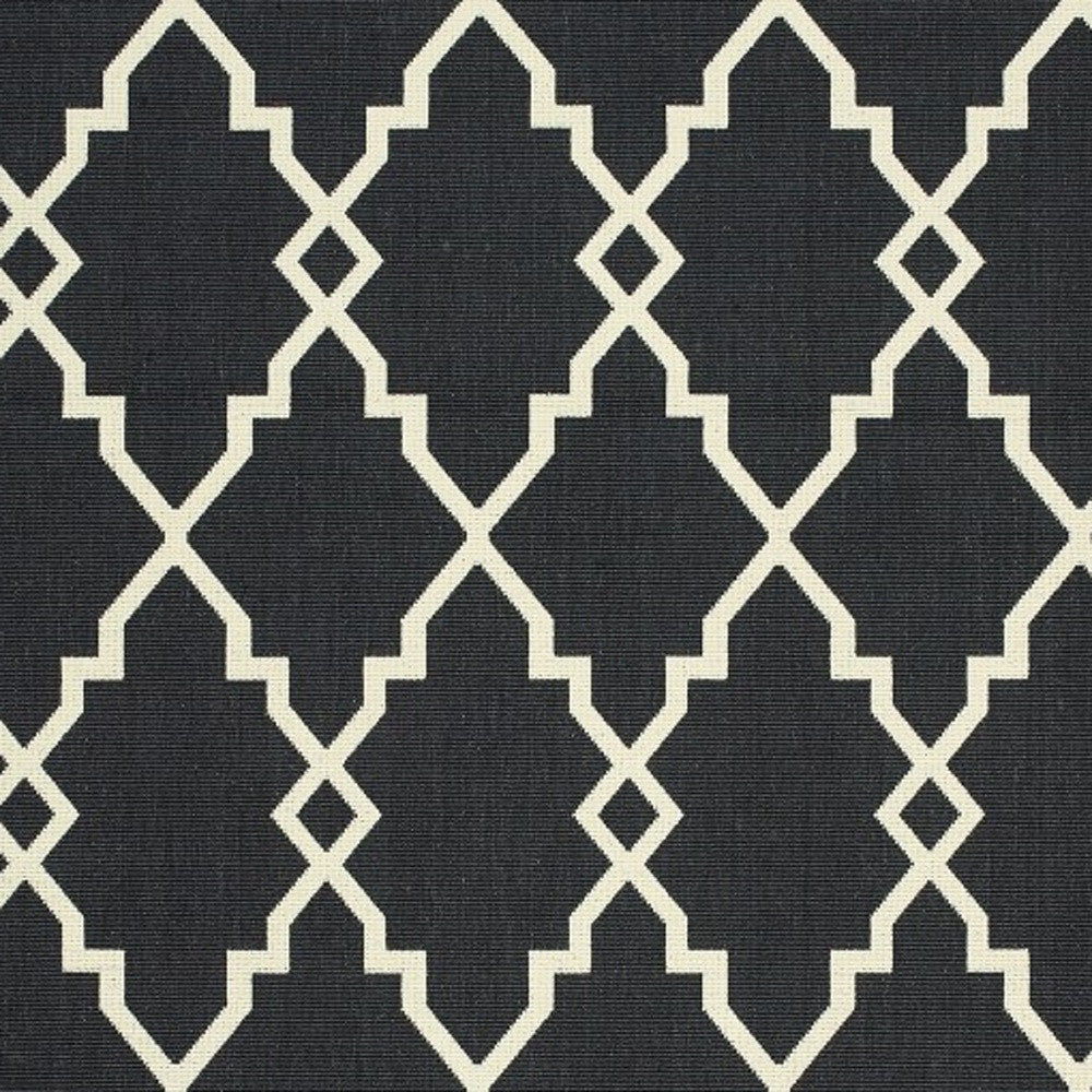 7' X 10' Black And Ivory Indoor Outdoor Area Rug-Outdoor Rugs-DECOROLALA