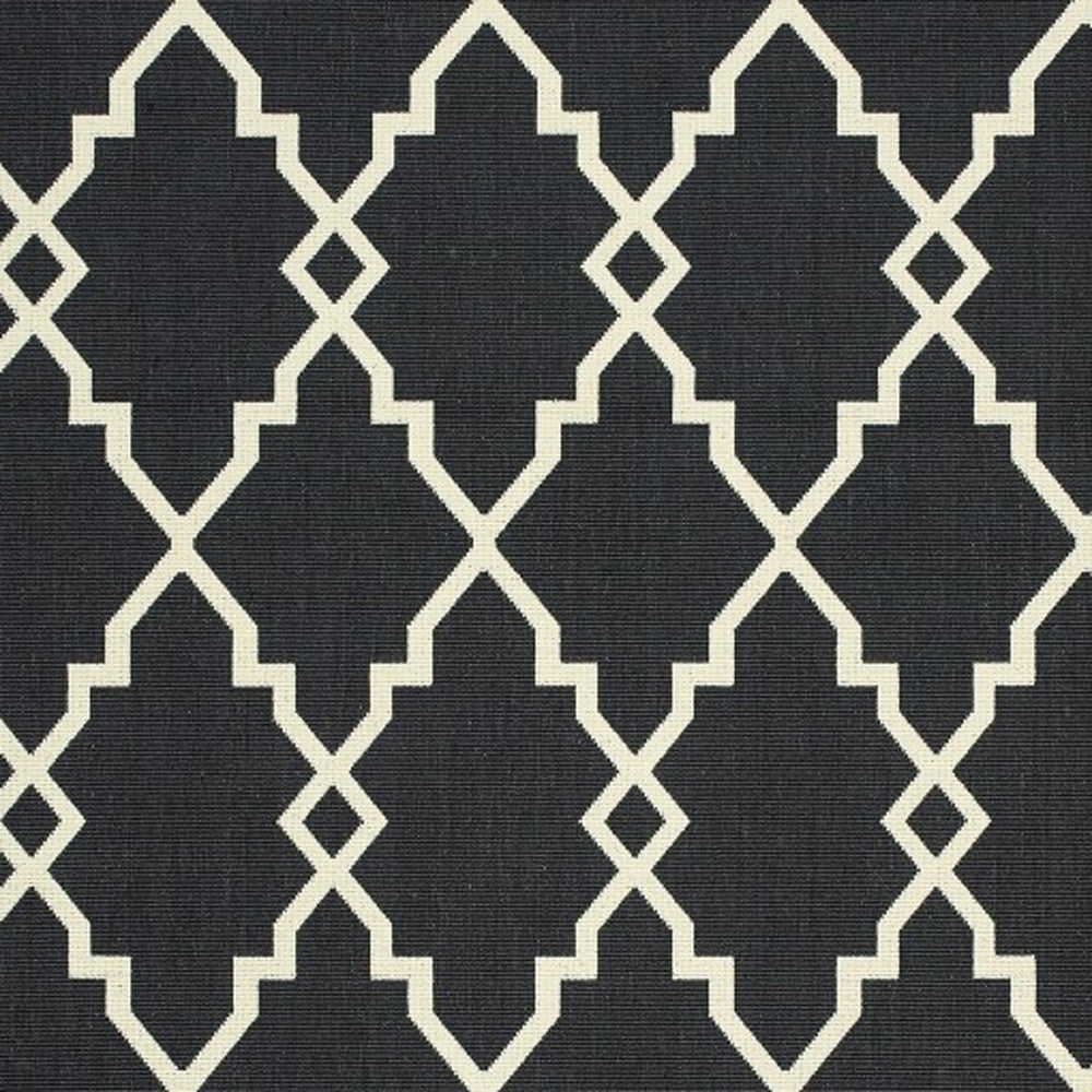 7' X 10' Black And Ivory Indoor Outdoor Area Rug-Outdoor Rugs-DECOROLALA