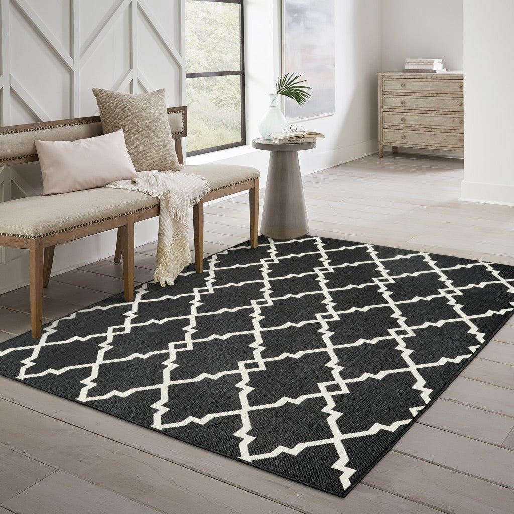 7' X 10' Black And Ivory Indoor Outdoor Area Rug-Outdoor Rugs-DECOROLALA