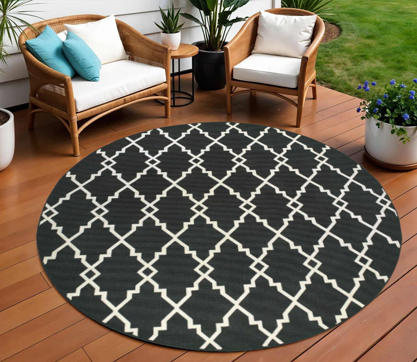 7' X 10' Black And Ivory Indoor Outdoor Area Rug-Outdoor Rugs-DECOROLALA