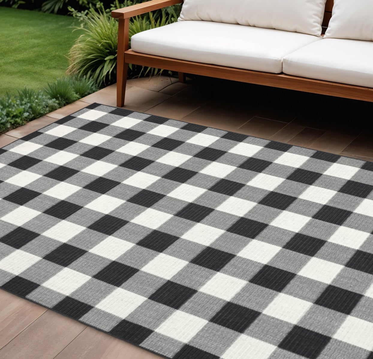 7' X 10' Black And Ivory Indoor Outdoor Area Rug-Outdoor Rugs-DECOROLALA