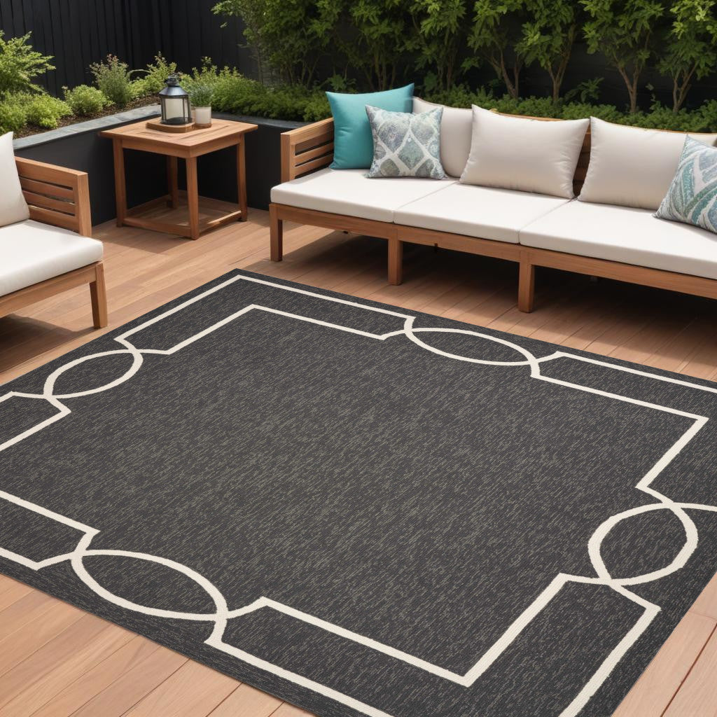 7' X 10' Onyx And White Geometric Handmade Indoor Outdoor Area Rug-Outdoor Rugs-DECOROLALA