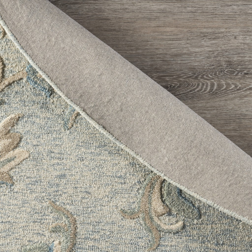 7' X 9' Blue And Ivory Wool Hand Tufted Area Rug-Area Rugs-DECOROLALA