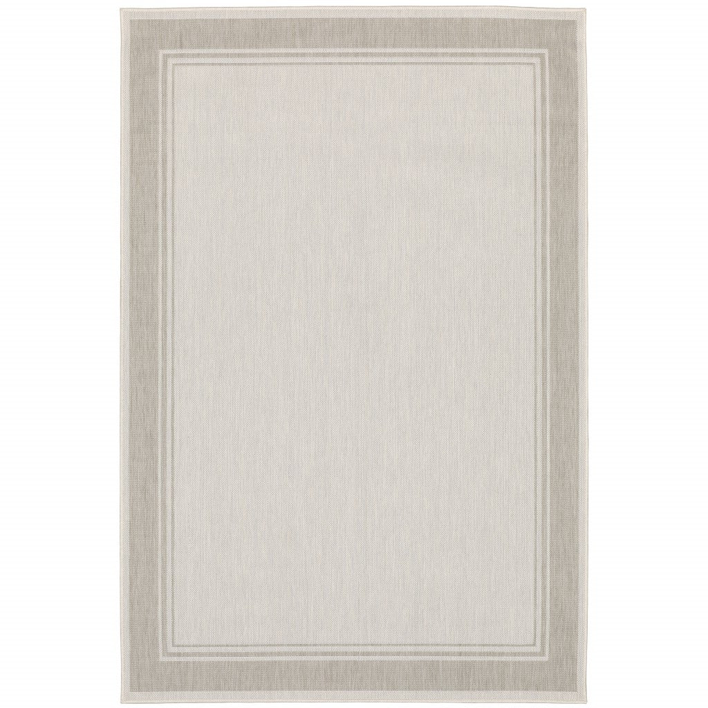 7' X 9' Gray And Ivory Indoor Outdoor Area Rug-Outdoor Rugs-DECOROLALA
