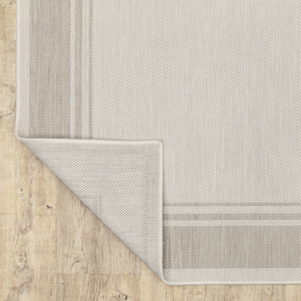 7' X 9' Gray And Ivory Indoor Outdoor Area Rug-Outdoor Rugs-DECOROLALA
