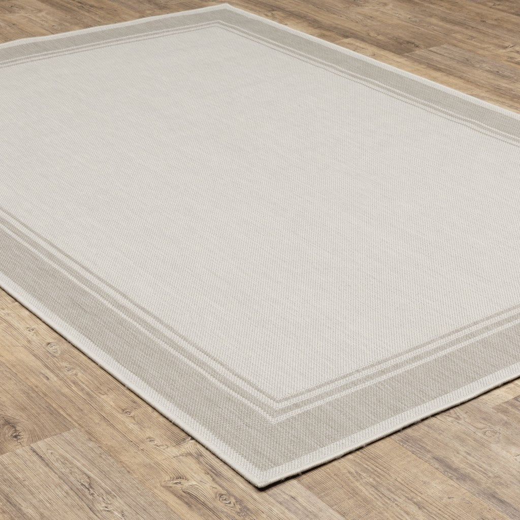 7' X 9' Gray And Ivory Indoor Outdoor Area Rug-Outdoor Rugs-DECOROLALA