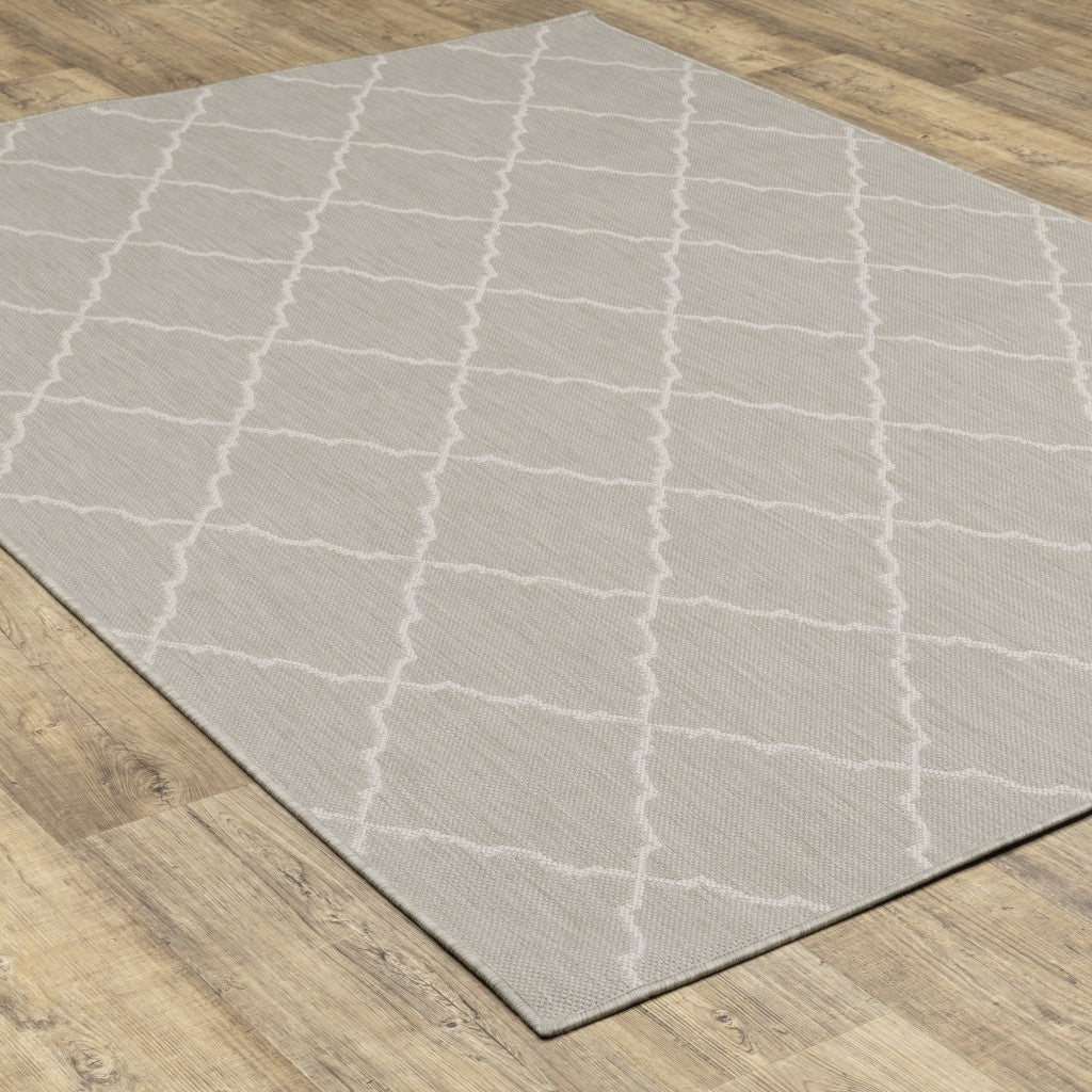 7' X 9' Gray And Ivory Indoor Outdoor Area Rug-Outdoor Rugs-DECOROLALA