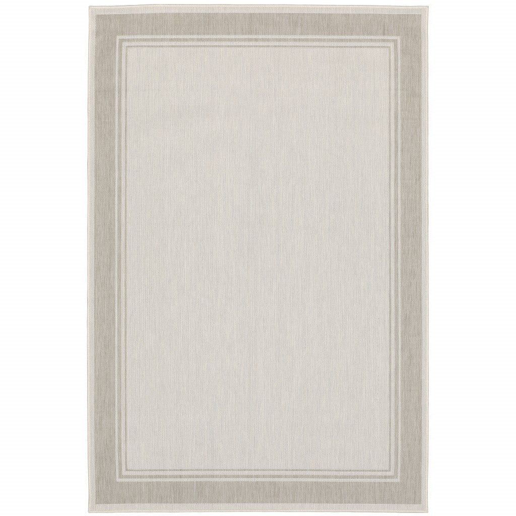 7' X 9' Gray And Ivory Indoor Outdoor Area Rug-Outdoor Rugs-DECOROLALA