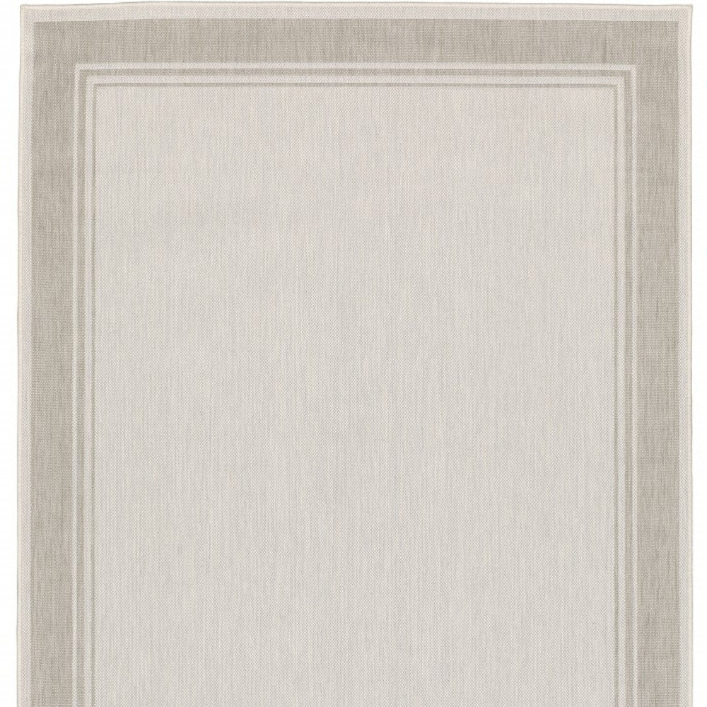 7' X 9' Gray And Ivory Indoor Outdoor Area Rug-Outdoor Rugs-DECOROLALA