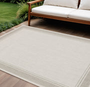 7' X 9' Gray And Ivory Indoor Outdoor Area Rug-Outdoor Rugs-DECOROLALA