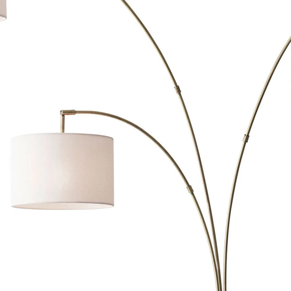 74" Brass Three Light Arc Floor Lamp With Off White Fabric Drum Shade-Floor Lamps-DECOROLALA
