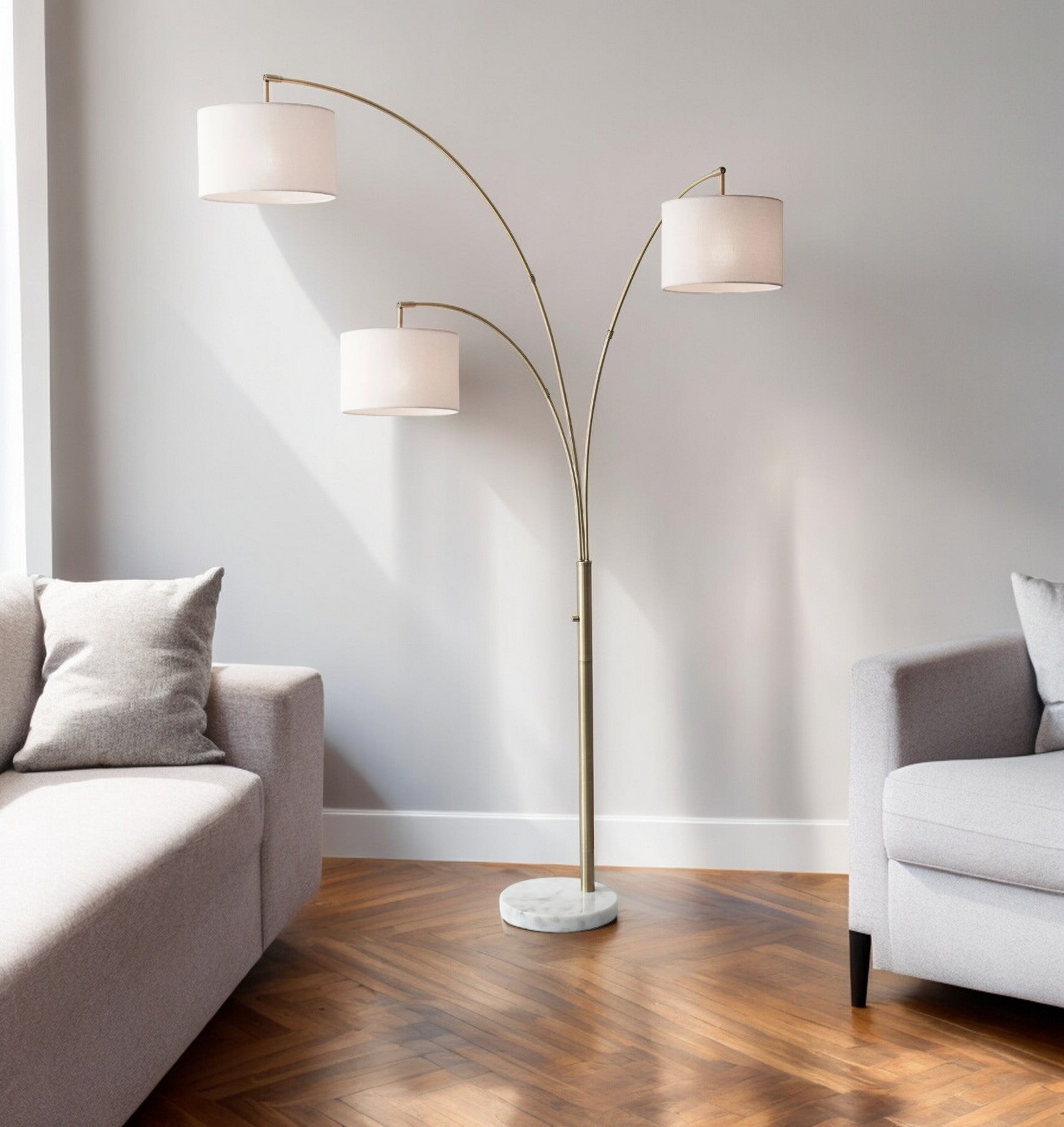 74" Brass Three Light Arc Floor Lamp With Off White Fabric Drum Shade-Floor Lamps-DECOROLALA