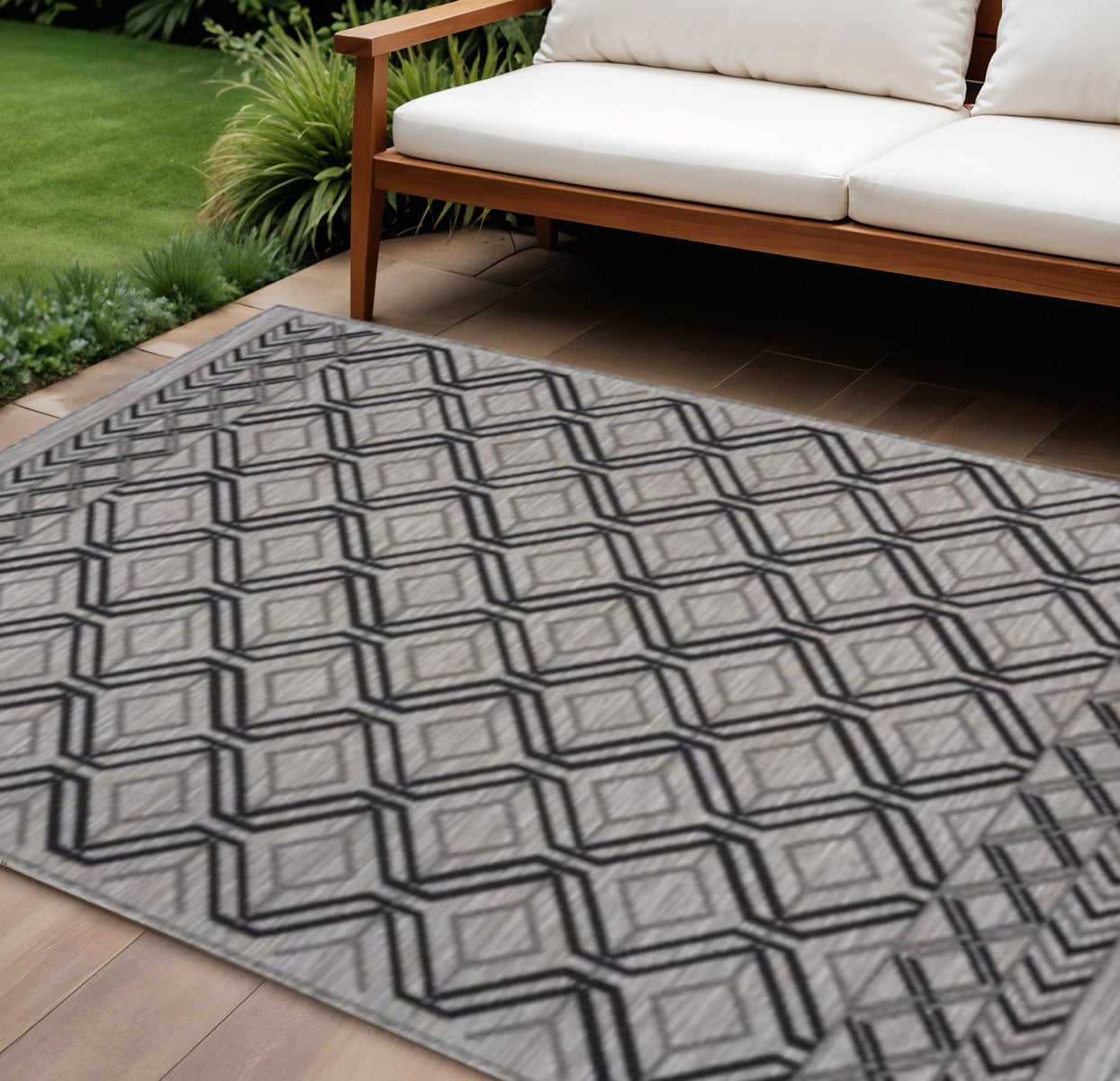 8' X 10' Black And Tan Indoor Outdoor Area Rug-Outdoor Rugs-DECOROLALA