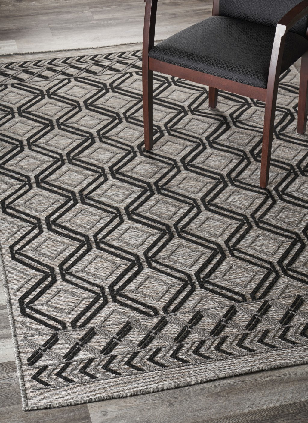 8' X 10' Black And Tan Indoor Outdoor Area Rug-Outdoor Rugs-DECOROLALA