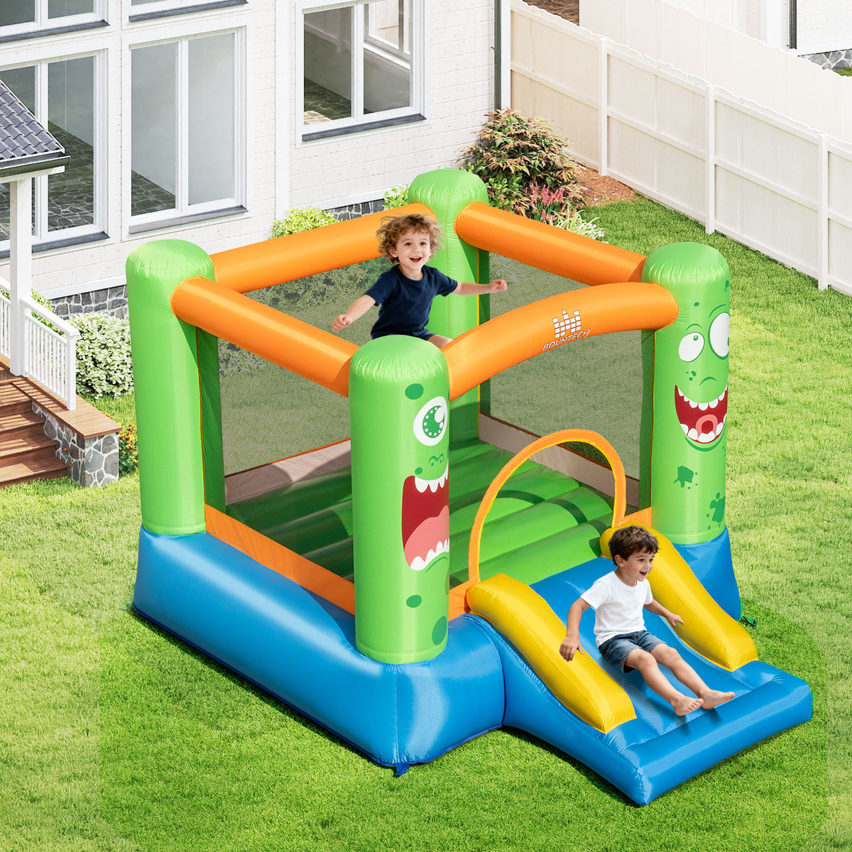 Château gonflable à thème monstre avec grande aire de saut et toboggan, soufflerie de 550 W incluse