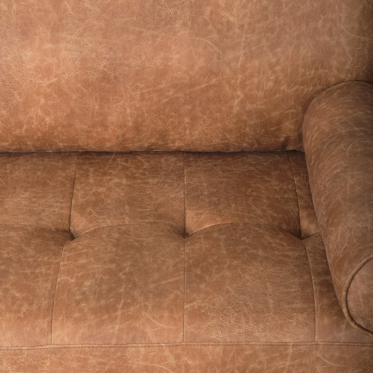 Loretta 88.0L x 36.2W x 33.9H Cognac Brown Faux Leather Three Seater Sofa with Two Bolster Cushions-Sofa & Sectionals-DECOROLALA