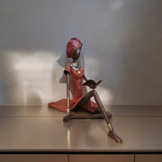 Vintage Bronze Seated West African Woman Reading Sculpture-Sculptures-DECOROLALA